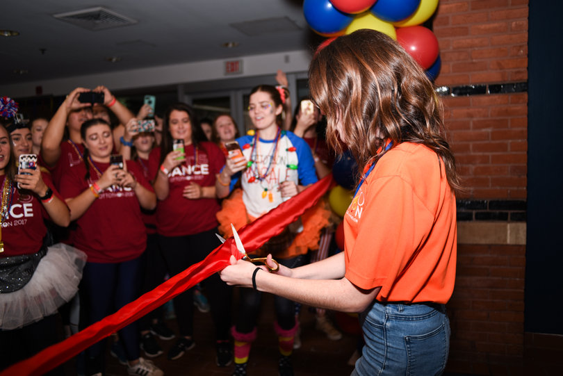 Meghan Dare, OttoTHON's executive director, cut the ribbon at 10 a.m., and dancers flooded into the auditorium. 