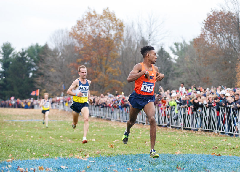 Just before Knight crossed the finish line, he glanced left and saw his coach, Chris Fox, smiling. 