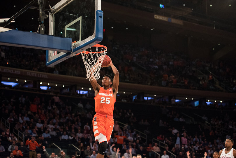 Battle rises up for a dunk. 