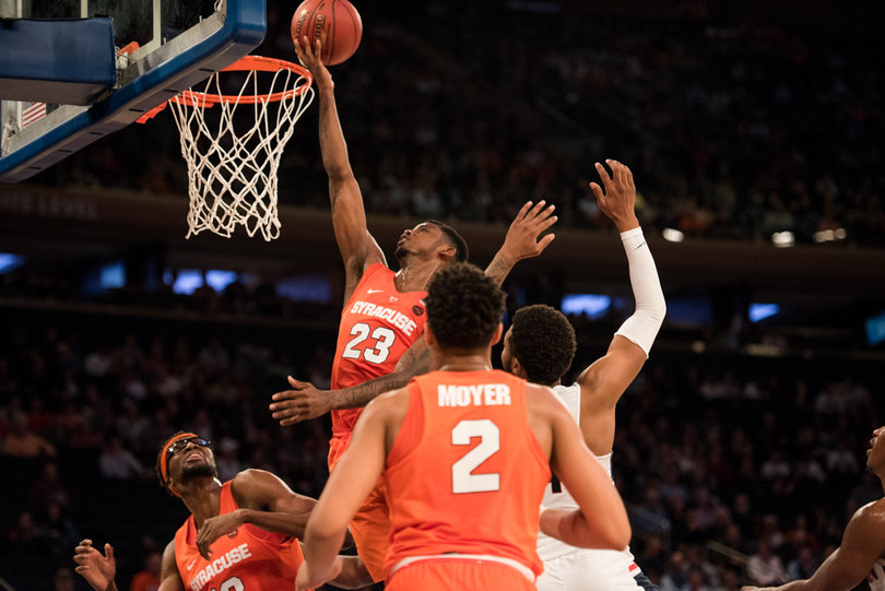 Howard goes up for a layup. 