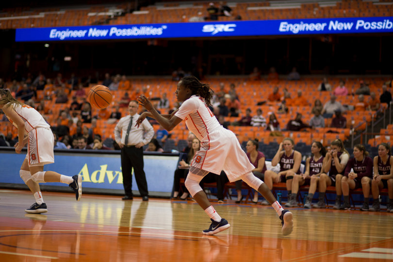 Cooper brings the ball up the floor.