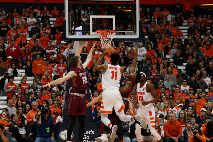 Brissett attempts to lay in the ball. Syracuse scored 28 of its points in the paint against Colgate. 