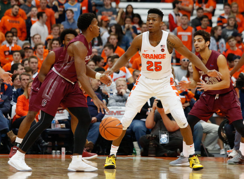 Battle and Frank Howard had a busy day atop the 2-3 zone as Colgate launched 35 3-pointers. 