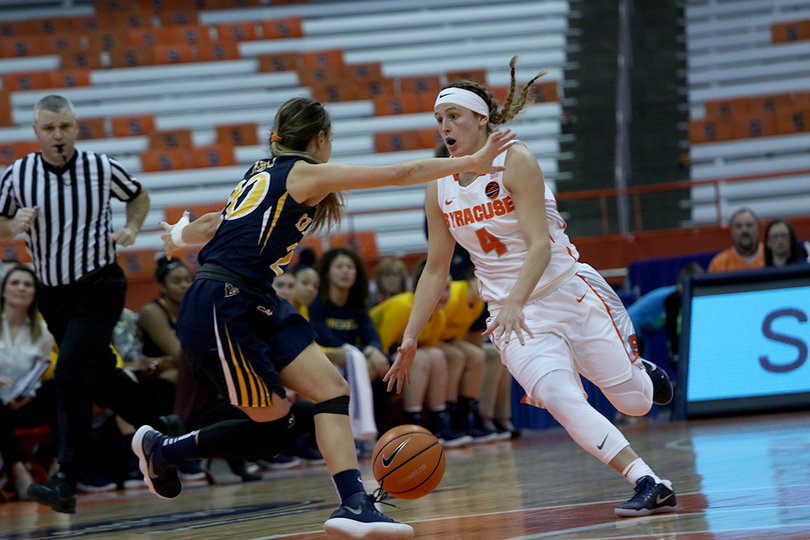 On the season, Mangakahia is averaging a double-double with 16.4 points and 11.3 assists per game.