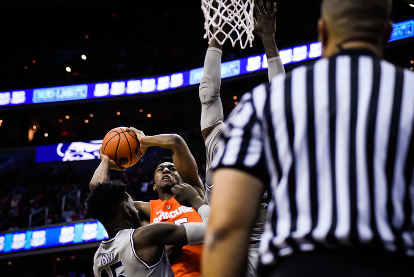 Every time Battle or another Syracuse player took it to the rack, they fought through a thicket of would-be shot blocking arms.