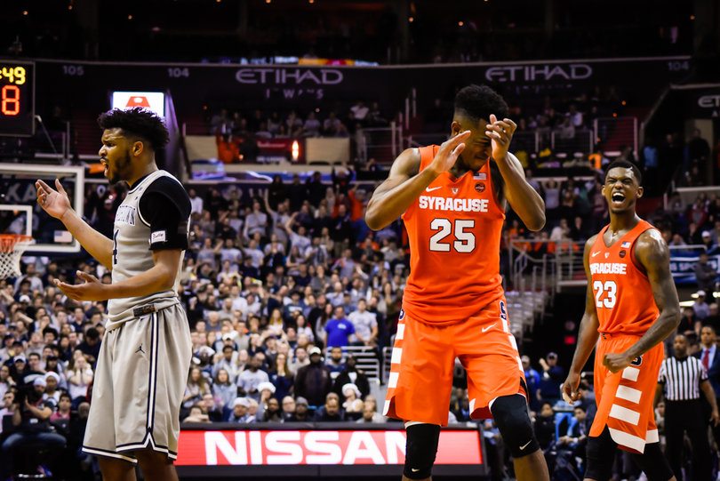 Battle celebrates a call in Syracuse's favor.
