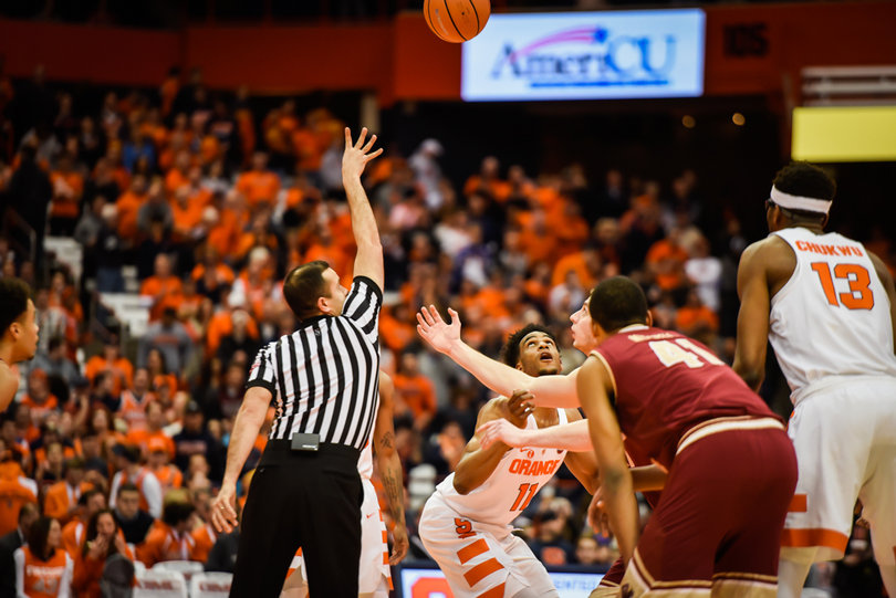 Syracuse and Boston College battle for the jump ball.