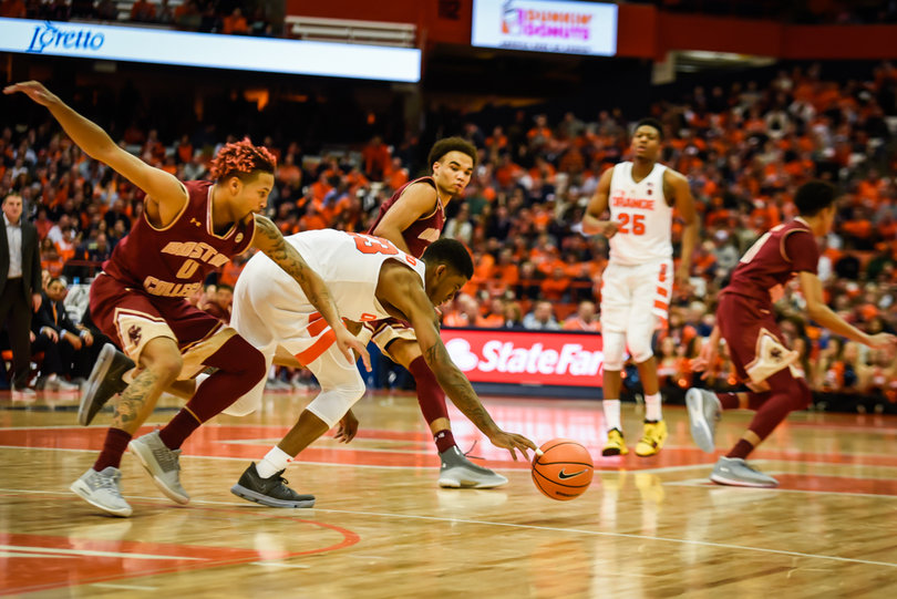 Frank Howard strides forward for the ball.