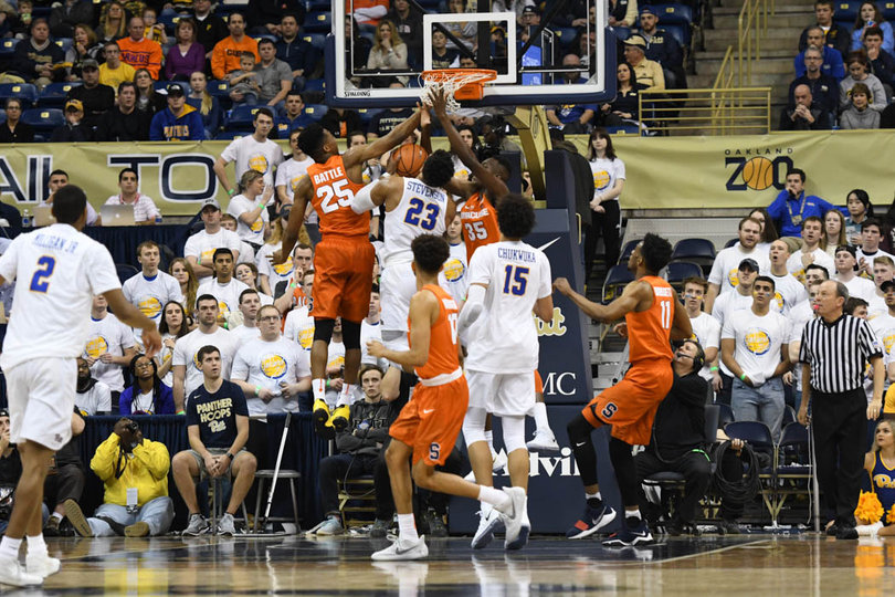 Battle flushes home a dunk over a Pittsburgh defender. 