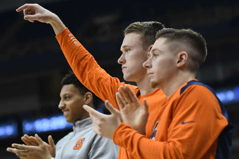 Matthew Moyer watched the game from the bench due to a sprained ankle. 