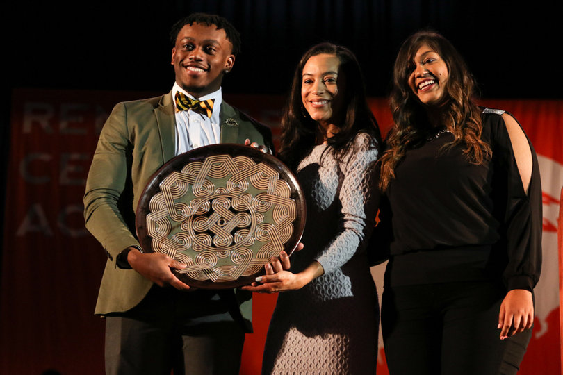 Syracuse University Student Association Vice President Angie Pati and Alpha Phi Alpha fraternity president Brandyn Munford presented Rye with an “expression of gratitude.”
