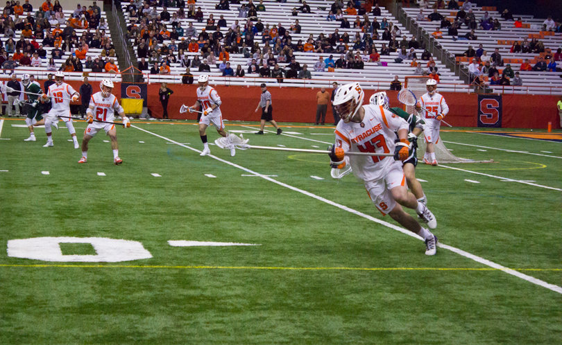 Defender Marcus Cunningham carries the ball up field.
