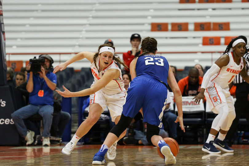 Duke's Rebecca Greenwell crosses up Tiana Mangakahia on Thursday.