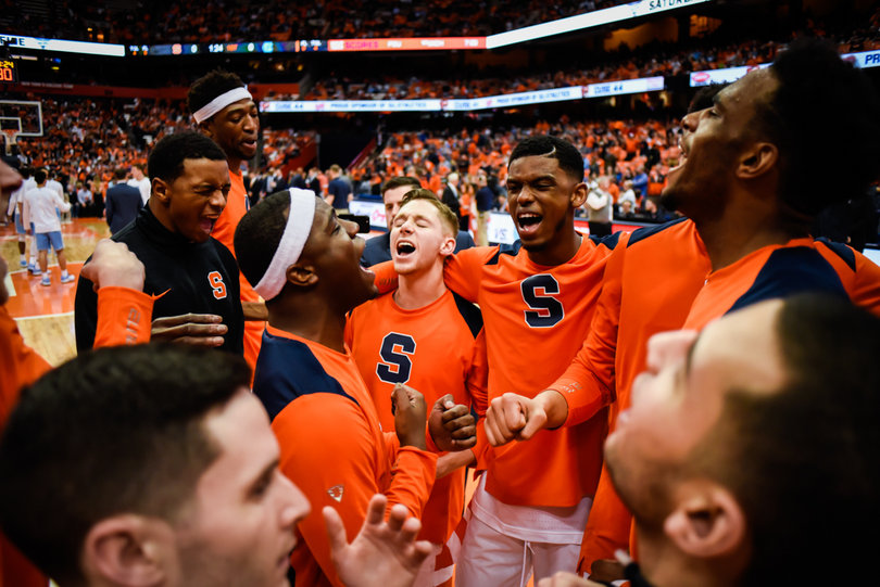 Adrian Autry, Jr., in the center with a headband, got SU fired up before the game.