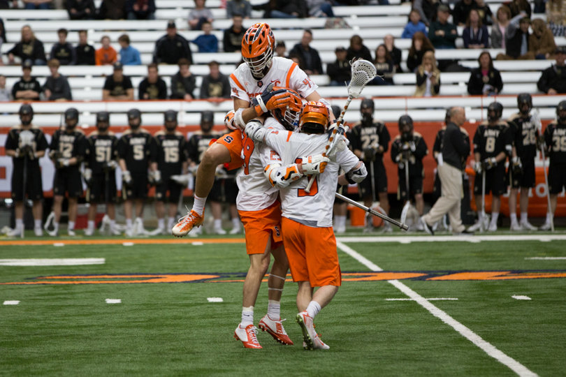 Syracuse celebrates a goal.