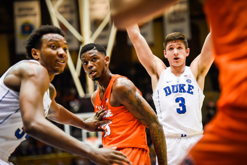 Duke used a 2-3 zone to great success, tipping numerous passes and holding Syracuse to 44 points.