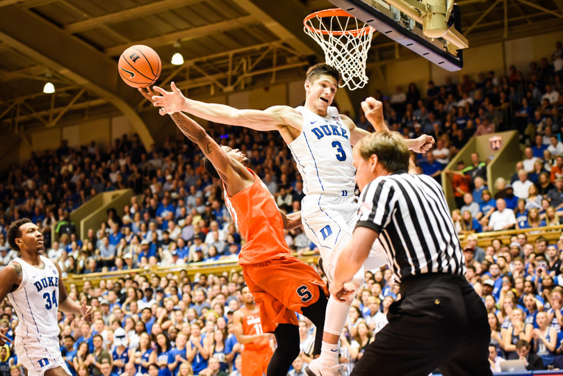 Grayson Allen and Frank Howard fly to the rim.