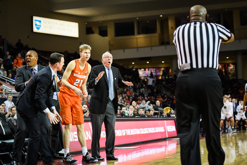 Syracuse's bench reacts to an official's call.