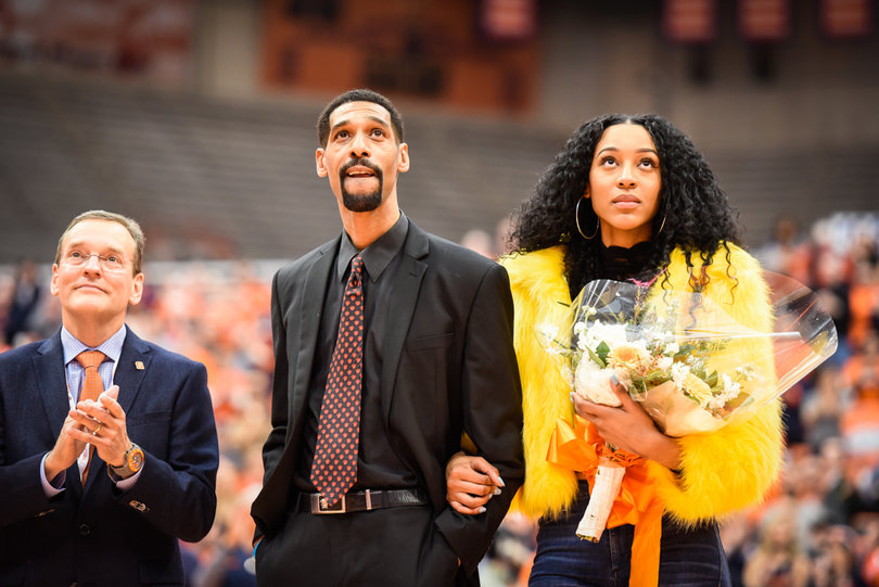 All-time Syracuse leading scorer Lawrence Moten watches his jersey being unveiled along the sides of the Carrier Dome. 