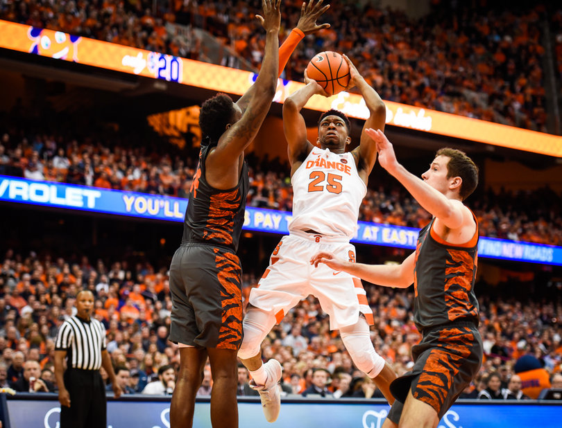 Battle rises up over two defenders.