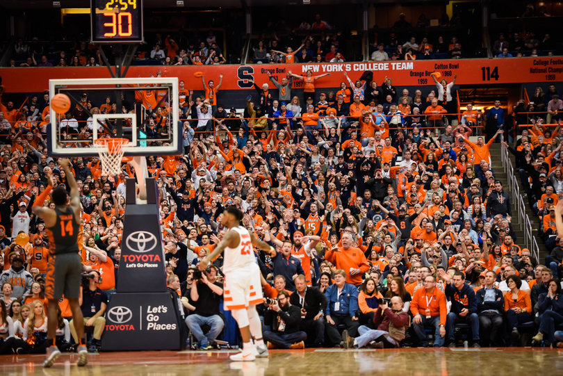 Fans wave their hands as Thomas misses two free throws.