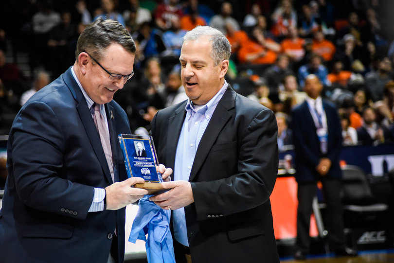 Woody Durham, who spent four decades broadcasting North Carolina men's basketball and football games, died Wednesday at 76. His son, Wes, is a play-by-play announcer for Fox Sports, and he received before the game a plaque honoring his father. 
