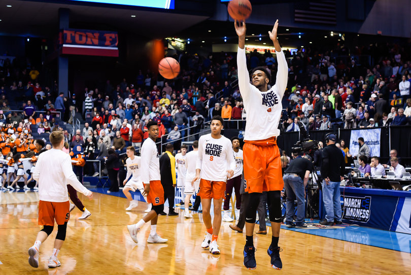 Junior point guard warms up. He missed two practices over the past few days as he battled strep throat. 