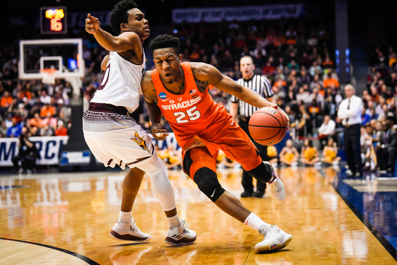 Battle tries to sneak down the baseline with his left, a side he's increasingly gone to as teams force him off his dominant right hand. 