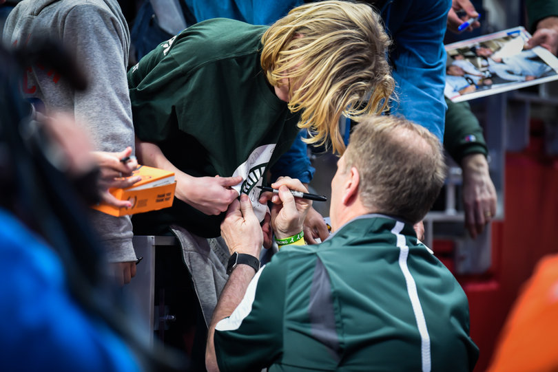 Tom Izzo, Michigan State head coach, signed autographs as he was leaving practice. Syracuse could play Michigan State on Sunday if it beats TCU.