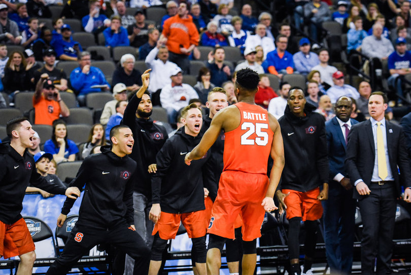 Battle celebrates with the bench after an and-one. He shot just 1-of-3 from the free-throw line, though. 