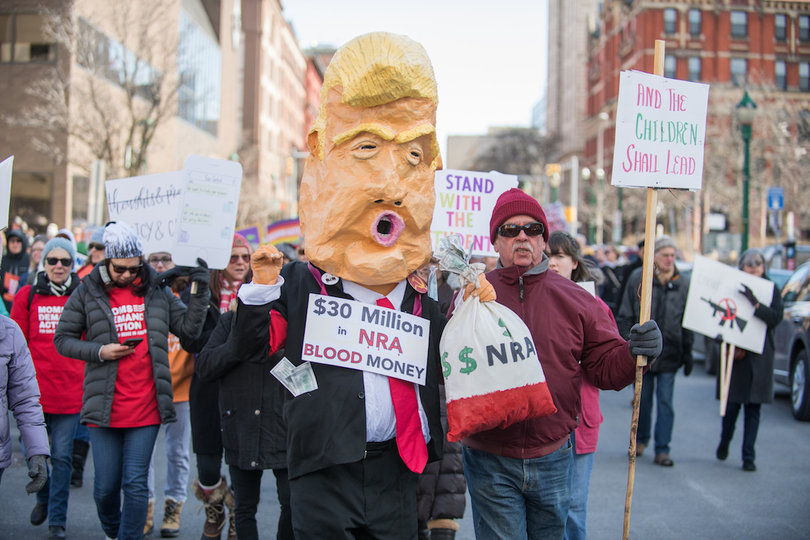 A protester dressed up as President Donald Trump during the march.