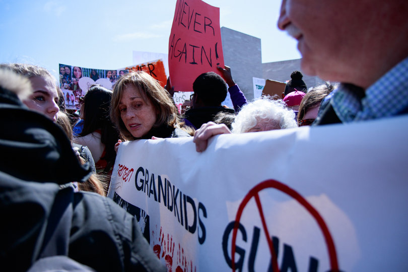 Hundreds of thousands of people packed together on Pennsylvania Avenue late Saturday morning.