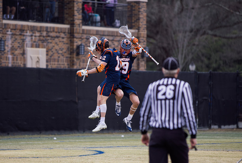 The Orange scored four of the game's final five goals to come away victorious. 