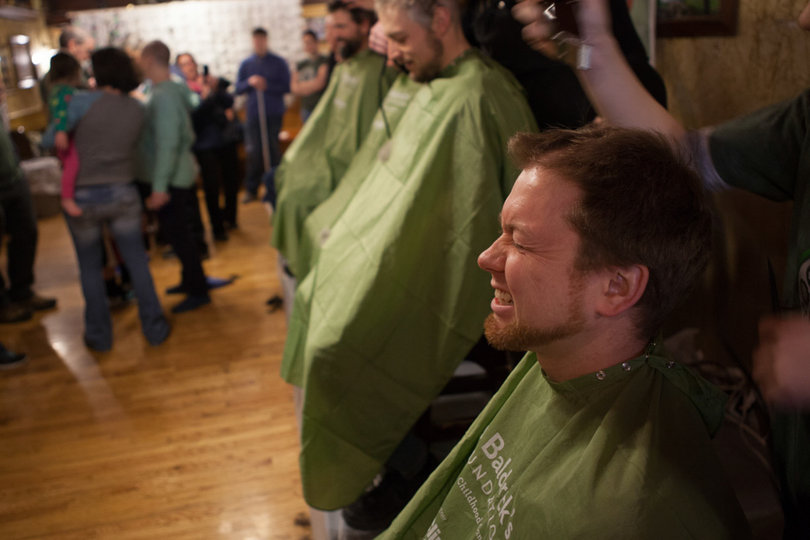 Rob Bergan of Auburn has shaved his head for the event every year for the last ten years. 