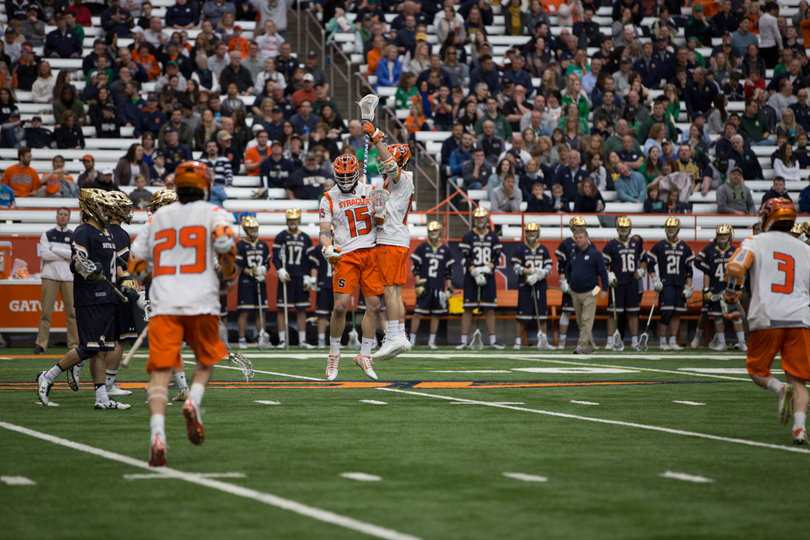 The Orange scored first and never trailed, eventually pulling away in the game's final two frames. 