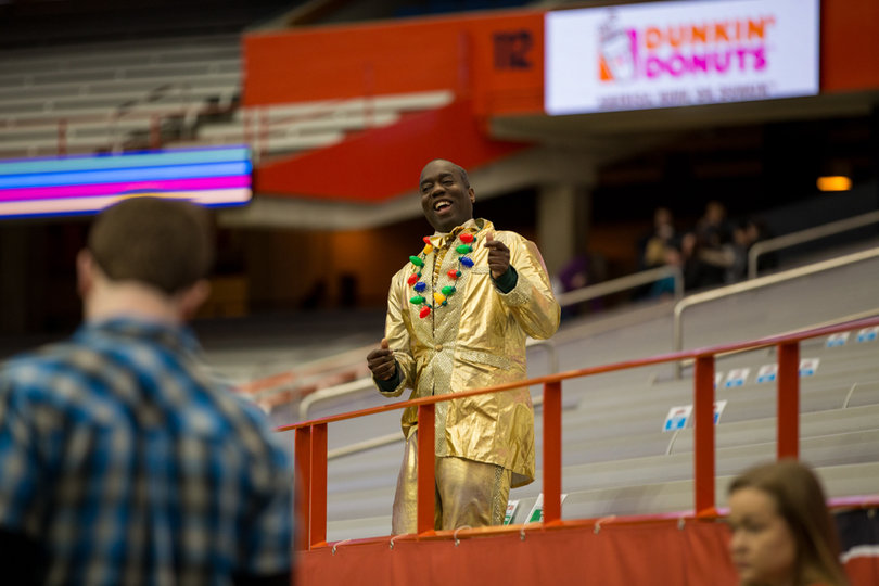 The game's final attendance was 931, including this brightly dressed fan.