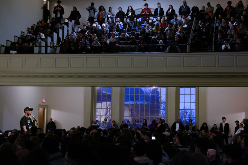 Attendees wait in line to speak at the Hendricks Chapel event. 