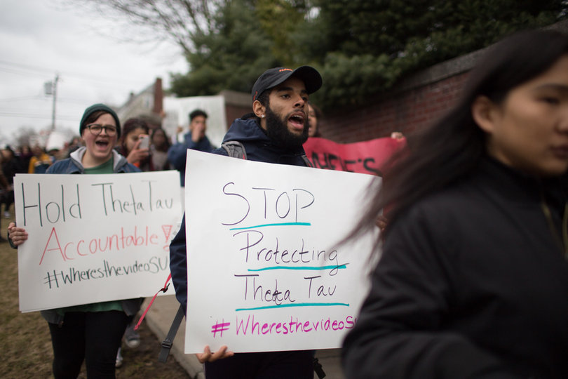 Students brought homemade signs to the march, which was held between Syverud's house on Comstock Avenue and Hendricks Chapel.