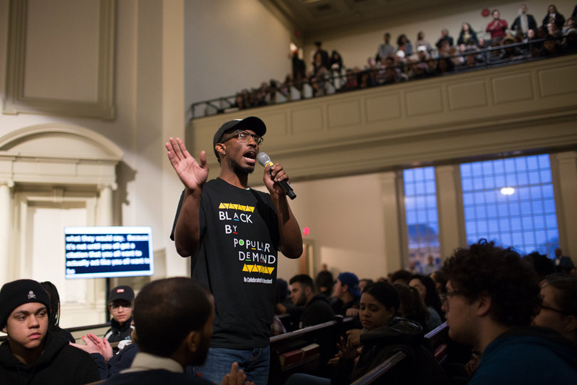 Senior Taryne Chatnam talks about his experience as a queer, black man at SU. He urged audience members to join organizations that mobilize and take action against discrimination.