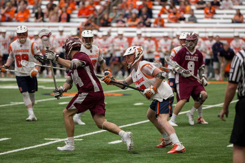 Brett Kennedy chases down a Colgate player.