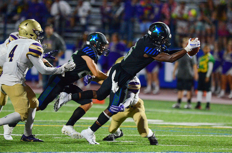 On Mcgriff's second touchdown, he dove across the end-zone line to secure the six points.