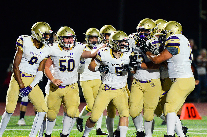 CBA celebrates with Szatkowski, who scored the lone touchdown for the Brothers.