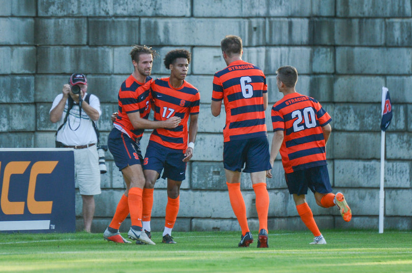 SU celebrates after Buchanan's goal.
