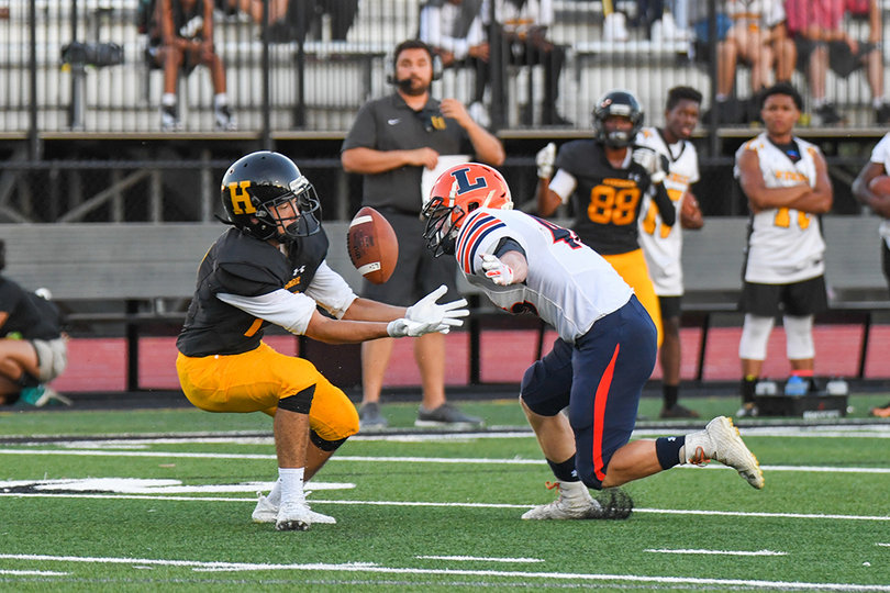 Eric Sparkman had an early interception for Henninger which he bobbled before eventually hauling it in. 