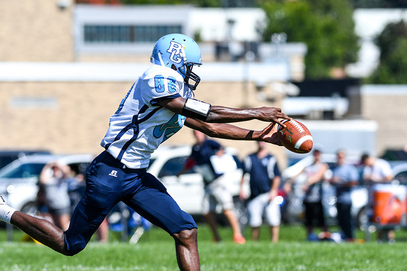 TJ Bradford barely reeled this ball in en route to a 40-yard touchdown from AJ Burnett.