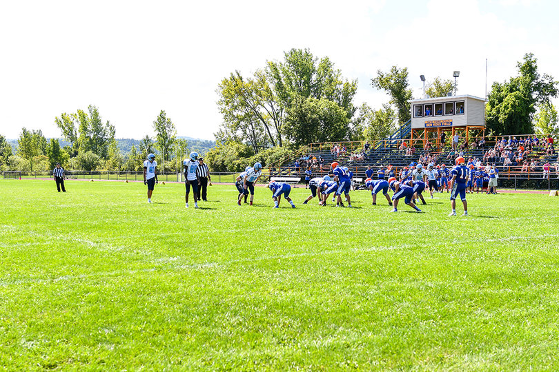In eight-man football, the offense drops two linemen as part of its change in formation. 