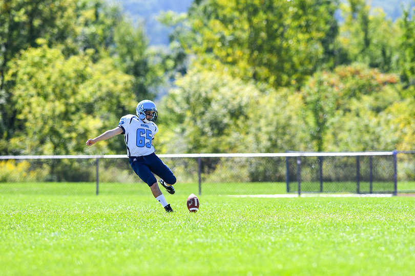 Ian Fisher handled kickoffs all afternoon long for the Cobras.