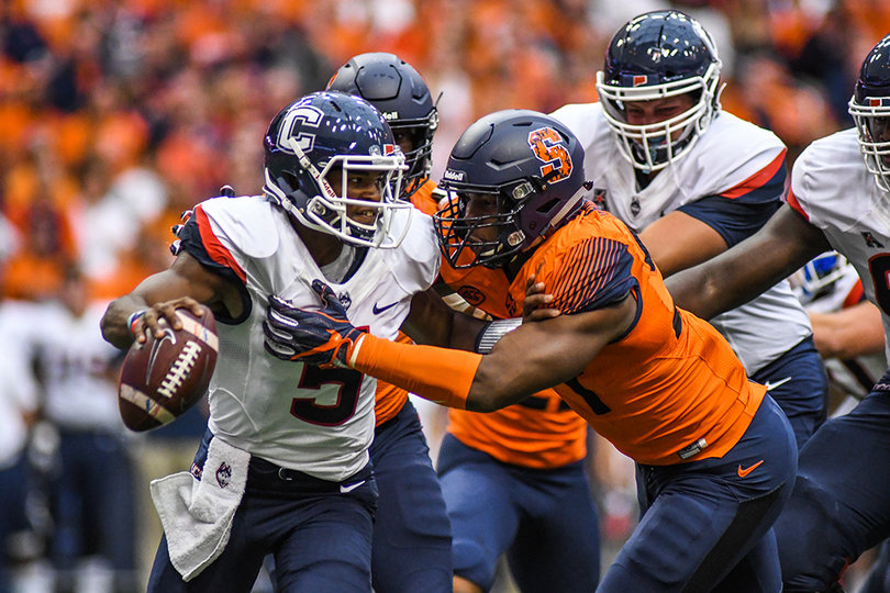 Robinson takes down Pindell as one of his three sacks. 
