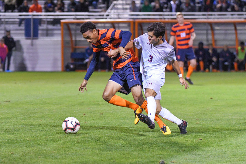Djimon Johnson, who received the start in place of Buchanan, battles for position. 