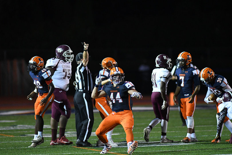 Jacob Vacco celebrates a first down on the ground. The Liverpool fullback carried 20 times.